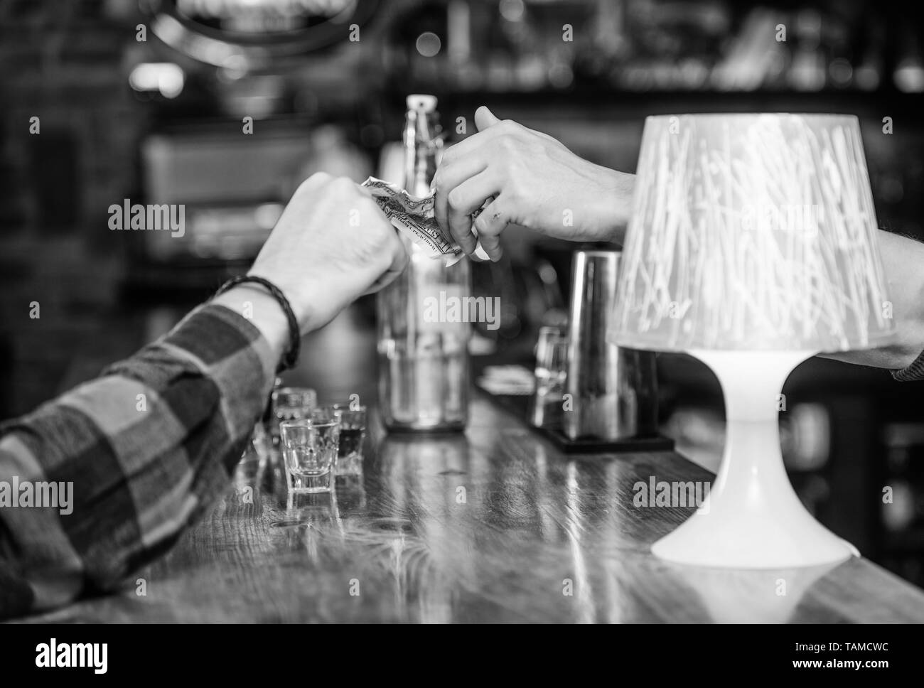 Cash payment. Ordering drinks in bar. Purchase and payment. Cash money