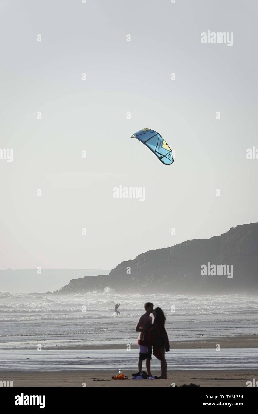 Gower, Swansea, Wales, UK. 26th May 2019. Weather: After a cool, damp and cloudy start beachgoers enjoyed a much brighter afternoon at Llangennith beach on the Gower peninsula, near Swansea, South Wales, with spells of warm sunshine despite the westerly breeze. Scattered showers are expected to return to some areas in the coming days but more southerly areas may remain dry. Credit: Gareth Llewelyn/Alamy Live News Stock Photo