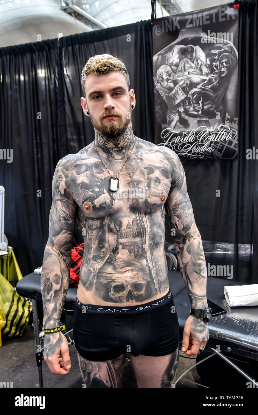 London, UK. 26th May, 2019. Jiri Zmetek Vintr, Tattoo a client at