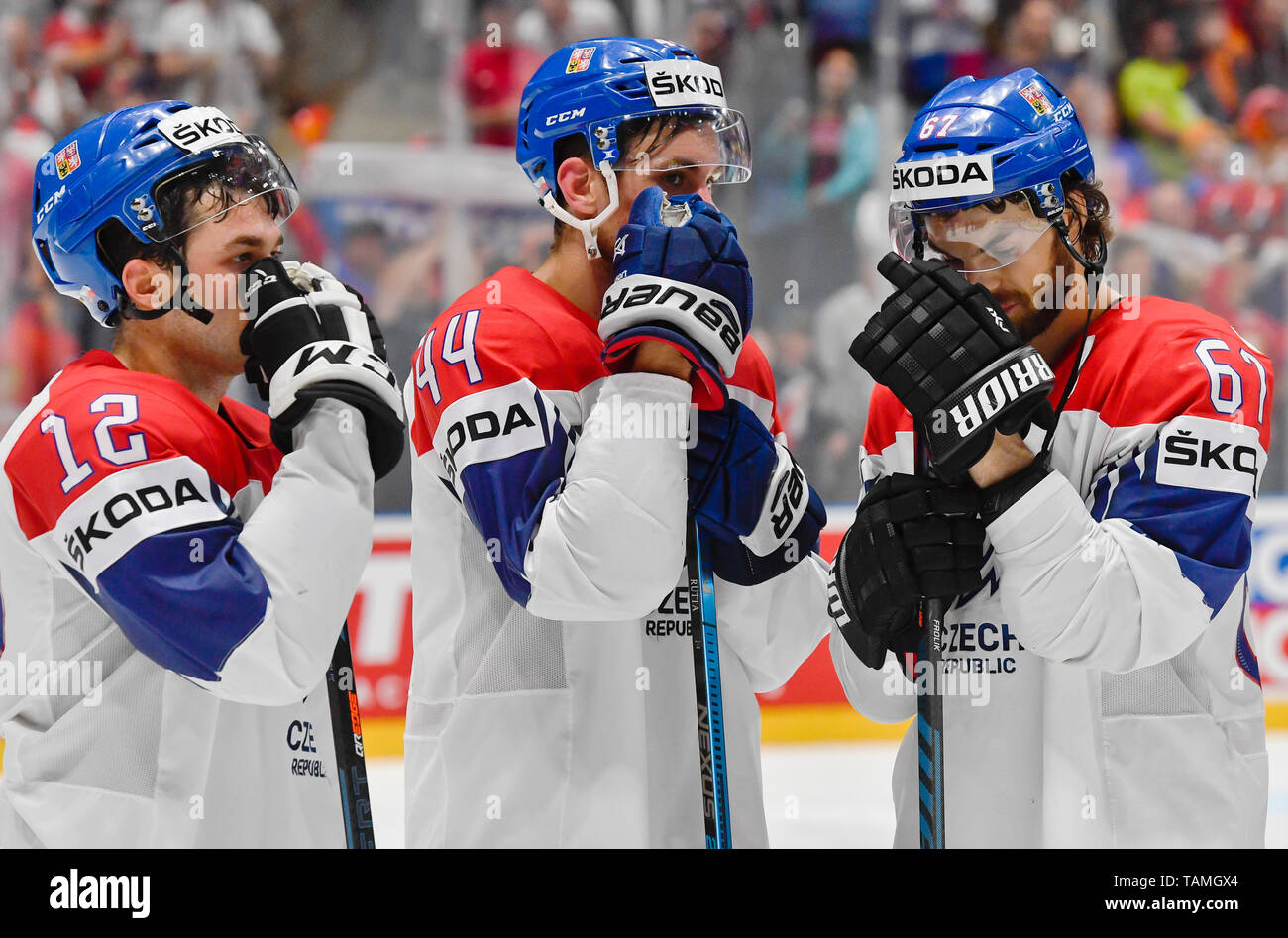 Bratislava, Slovakia. 26th May, 2019. L- R Sad Czech hockey players DOMINIK SIMON, JAN RUTTA, MICHAEL FROLIK after loosing the Ice Hockey World Championships bronze medal match between Russia and Czech Republic at the Ondrej Nepela Arena in Bratislava, Slovakia, Sunday, May 26, 2019. Credit: Vit Simanek/CTK Photo/Alamy Live News Stock Photo