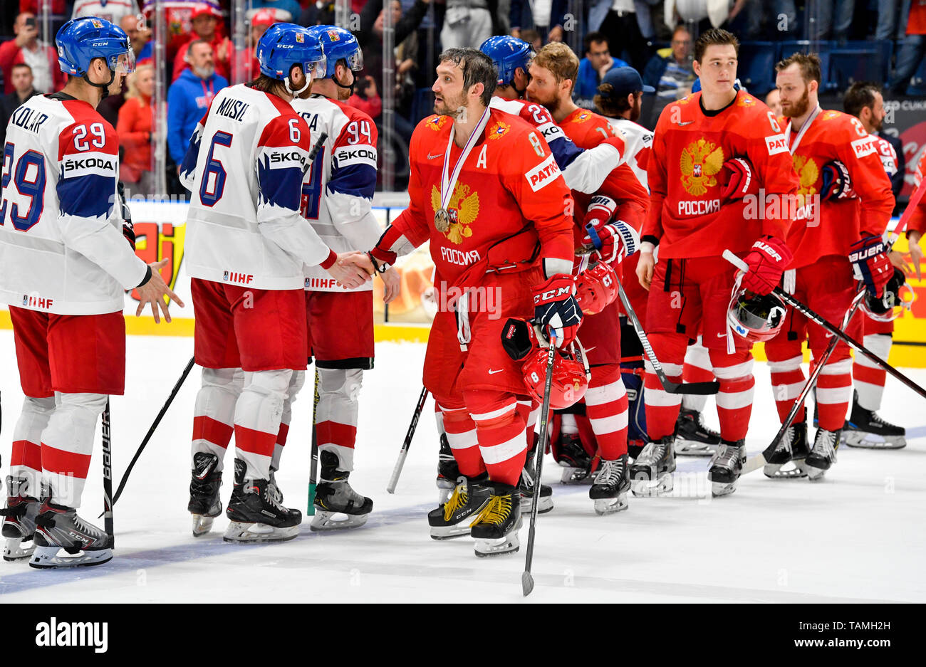 Bratislava, Slovakia. 26th May, 2019. L- R Sad Czech hockey players greet  Alexander Ovechkin (centre) of Russia after loosing the Ice Hockey World  Championships bronze medal match between Russia and Czech Republic