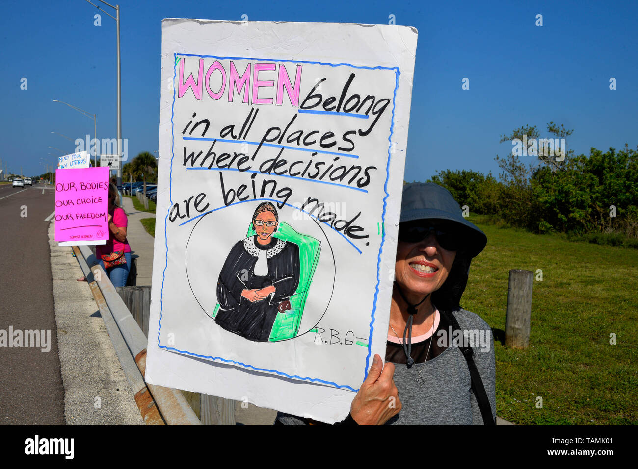 Brevard County, Melbourne. Florida. May 26, 2019. As with other city’s across America woman came out in force to protest against having their rights taken away from them regarding abortion. Home made signs stating their opinion of law makers were waved at passing motorist on the Eau Gallie Causeway. The Brevard Woman’s March group stated “We are fired up and letting the world know where we stand. WE WON’T GO BACK! They're coming for women. They're coming for doctors. They're coming for Roe.” Photo Credit Julian Leek / Alamy Live News Stock Photo