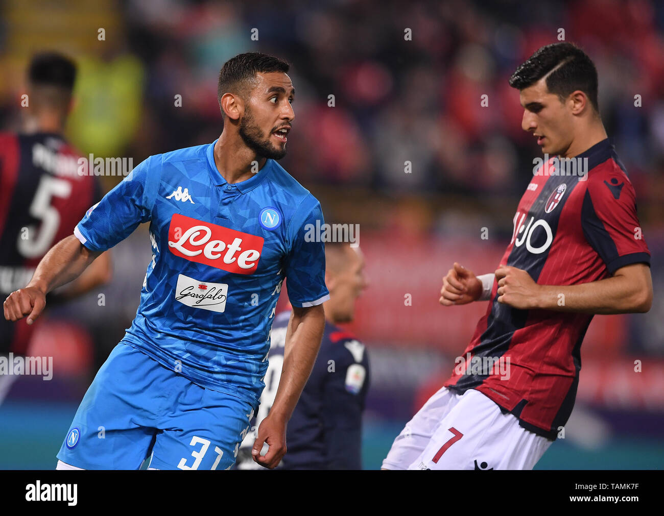 Bologna, Italy. 25th May, 2019. Napoli's Faouzi Ghoulam (L) celebrates his goal during a Serie A soccer match between Bologna and Napoli in Bologna, Italy, May 25, 2019. Bologna won 3-2. Credit: Alberto Lingria/Xinhua/Alamy Live News Stock Photo