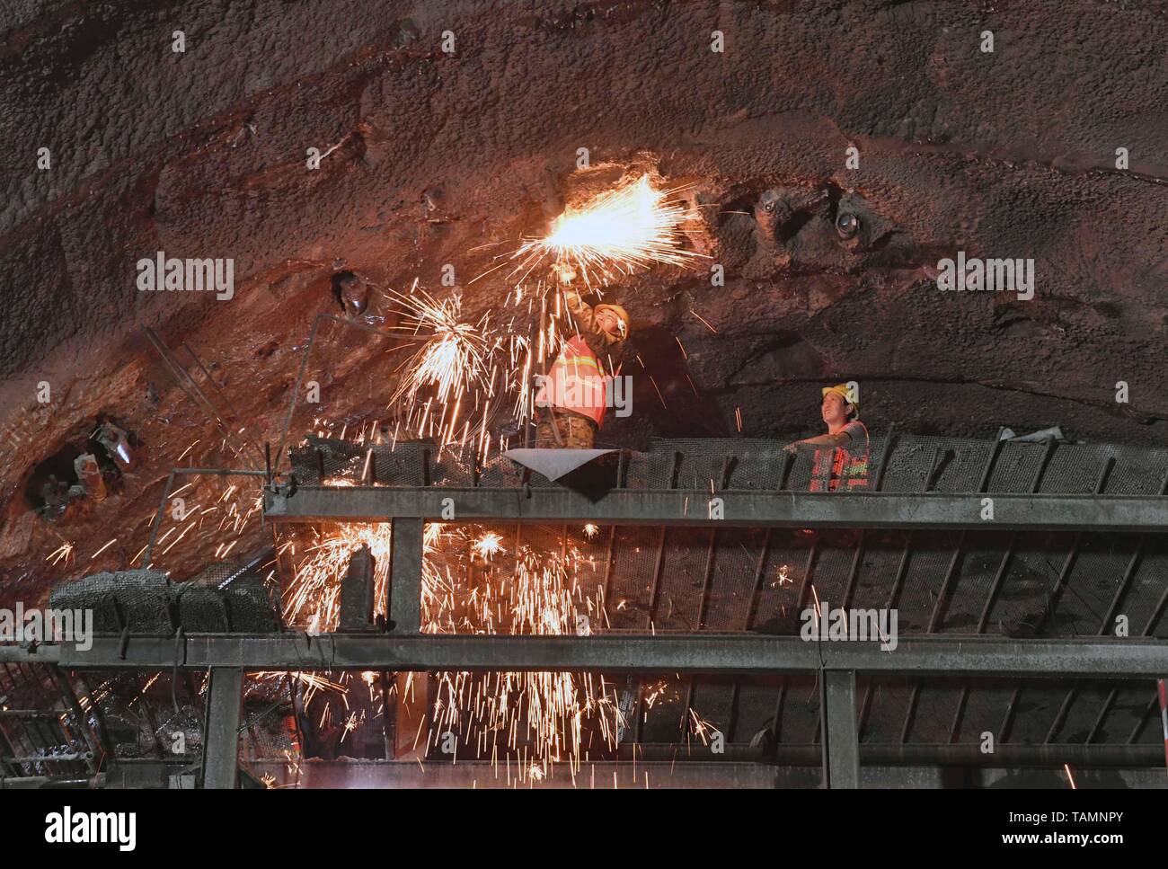puer-25th-may-2019-constructors-work-at-the-construction-site-of-dajianshan-railway-tunnel-of-the-yuxi-mohan-railway-in-southwest-chinas-yunnan-province-may-25-2019-credit-yang-zongyouxinhuaalamy-live-news-TAMNPY.jpg