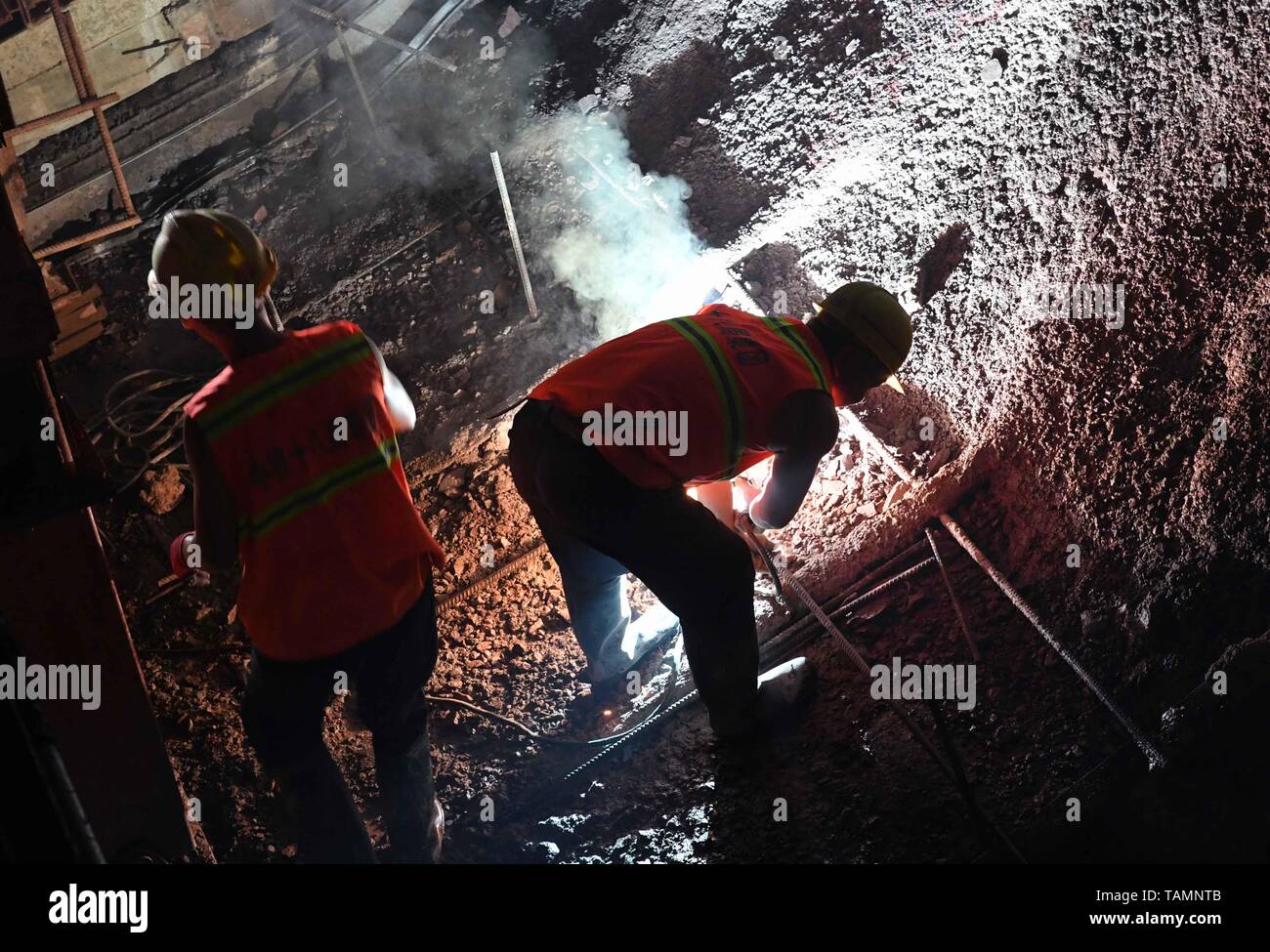 puer-25th-may-2019-constructors-work-at-the-construction-site-of-dajianshan-railway-tunnel-of-the-yuxi-mohan-railway-in-southwest-chinas-yunnan-province-may-25-2019-credit-yang-zongyouxinhuaalamy-live-news-TAMNTB.jpg