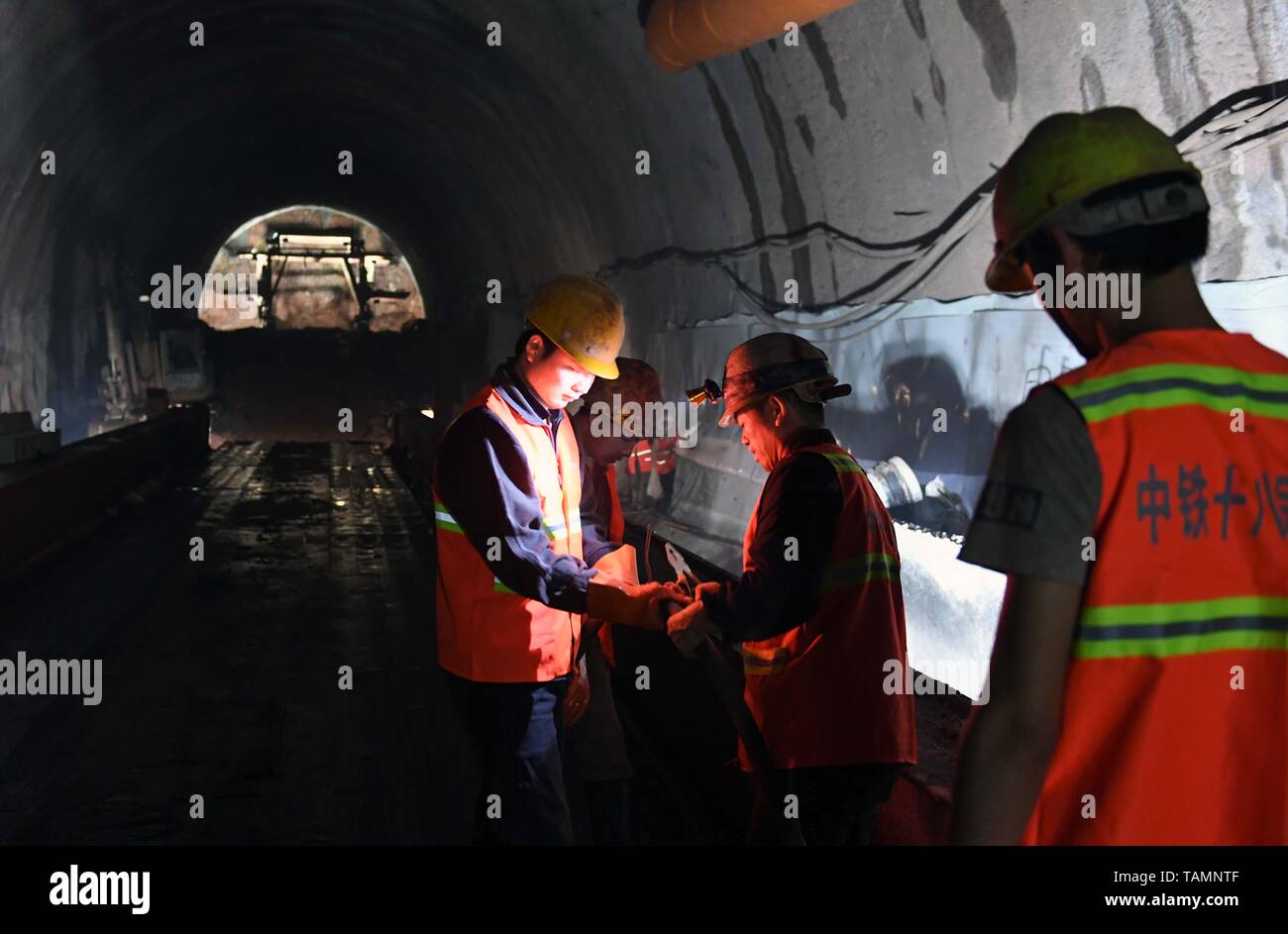 puer-25th-may-2019-constructors-work-at-the-construction-site-of-dajianshan-railway-tunnel-of-the-yuxi-mohan-railway-in-southwest-chinas-yunnan-province-may-25-2019-credit-yang-zongyouxinhuaalamy-live-news-TAMNTF.jpg