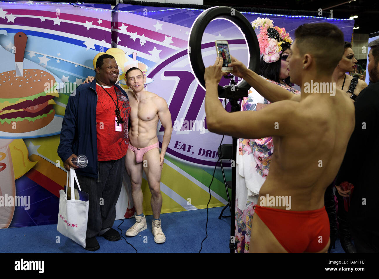 Los Angeles, California, USA. 15th Mar, 2019. (EDITORS NOTE: Image contains nudity.) Attendees poses for a picture at RuPaul's DragCon LA 2019 in Los Angeles, California. The annual three-day RuPaul's DragCon is the world's largest drag culture convention and takes place in New York and Los Angeles. Credit: Ronen Tivony/SOPA Images/ZUMA Wire/Alamy Live News Stock Photo