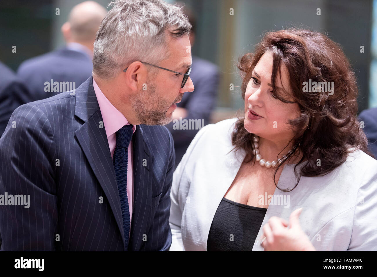 21 May 2019, Belgium, Brüssel: 21.05.2019, Belgium, Brussels: The German Minister of State for Europe, Michael Roth (L), will speak with the Maltese Minister for European Affairs and Equality, Helena Dalli (R), before the start of a meeting of EU Ministers for General Affairs on 21 May 2019 in the Europa building in Brussels. The General Affairs Council coordinates preparations for European Council meetings. It is also responsible for a number of overarching policy areas. The GAC is essentially composed of the Ministers for European Affairs of all EU Member States. The European Commission is u Stock Photo