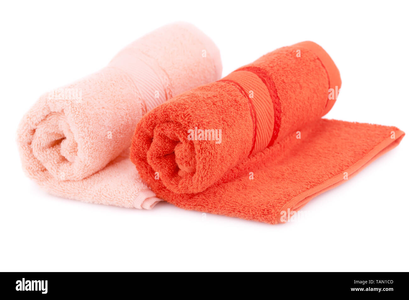 Colorful rolled towels isolated on white background. Stock Photo