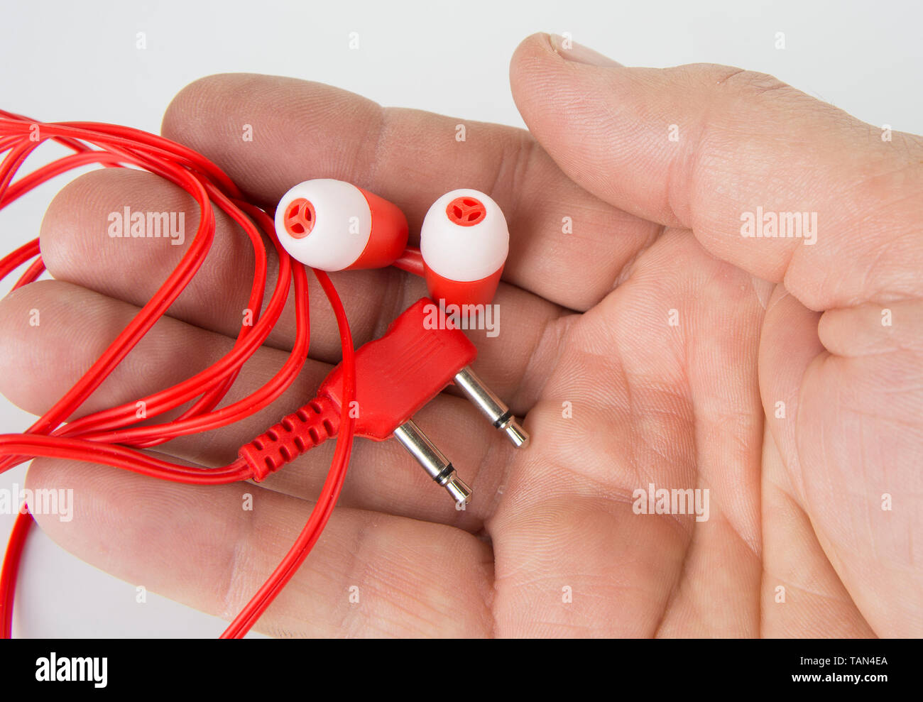 Disposable headphones in airplane for music and movies Stock Photo