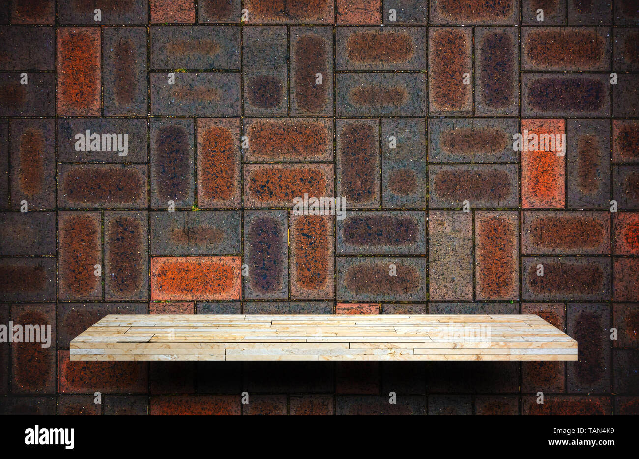 empty shelf product display on Red brick wall background Stock Photo