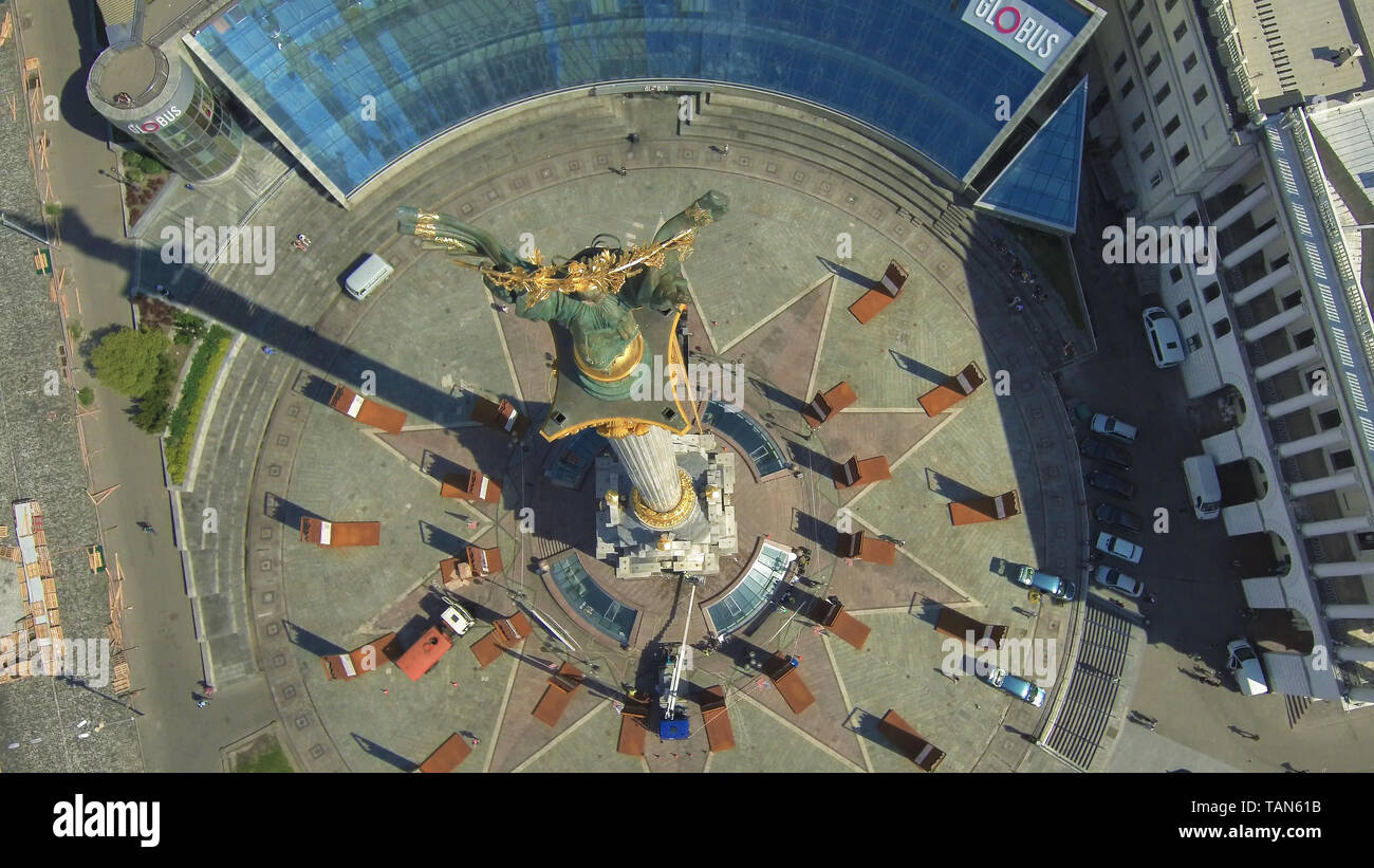 Flying drone above the square in the city center. Top view of the Independence Maidan. Photo in the style of the film Inception. Ukraine Kiev Independence Maidan Stock Photo
