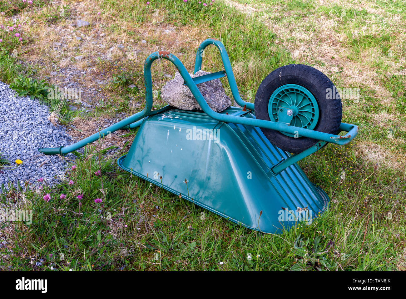 upturned wheelbarrow in garden, County Kerry, Ireland Stock Photo Alamy