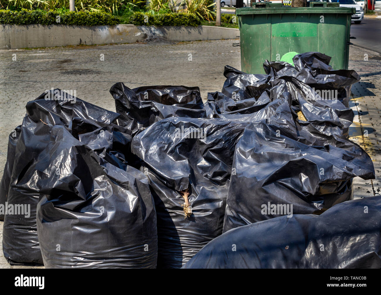 Street city trash bags Stock Photo Alamy