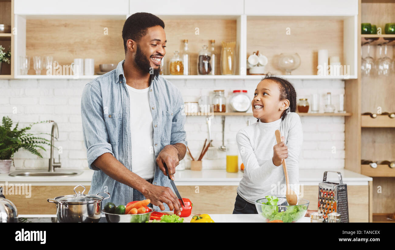 Cooking dinner surprise for mother concept Stock Photo - Alamy