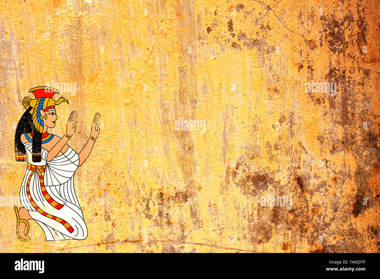 Grunge background with old stucco texture of yellow color and Egyptian