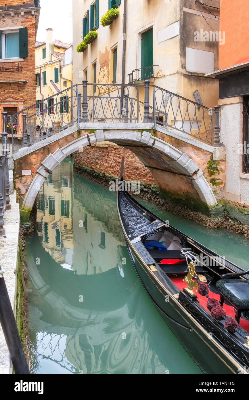 Traditional Gondolas on canal in Venice, Italy. Stock Photo