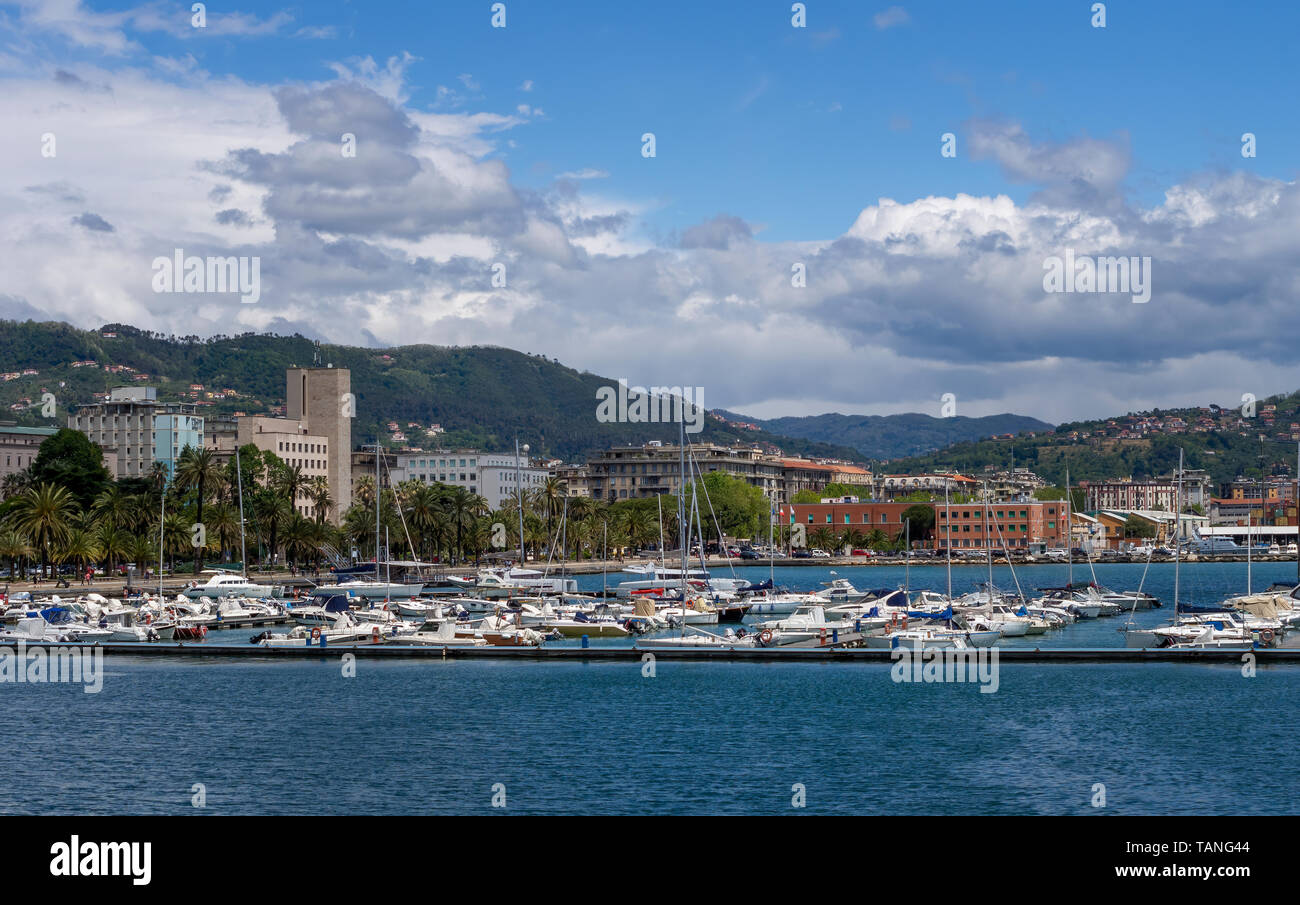 LA SPEZIA, ITALY - MAY 15, 2019: La Spezia town, seafront with palm trees and marina, looking inviting in the sunshine. Stock Photo