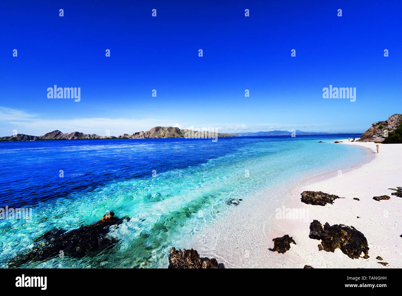 A beautiful white sand beach in Komodo national park in Indonesia. Stock Photo