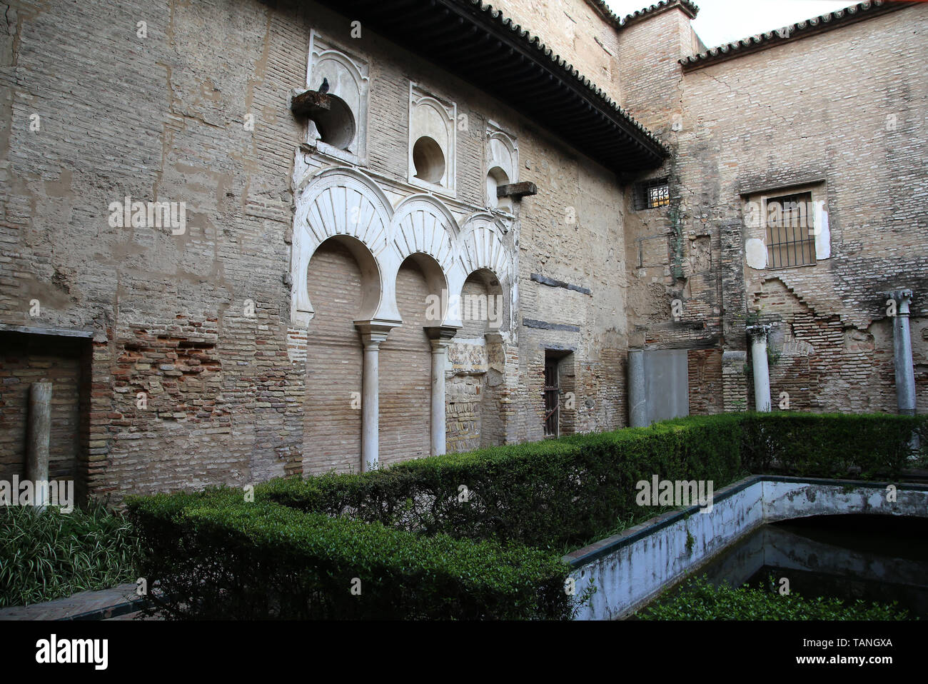 Spain. Seville. Alcazar of Seville. Patio del Yeso, 12th century. Part of old Almohad palace. North portico. Stock Photo