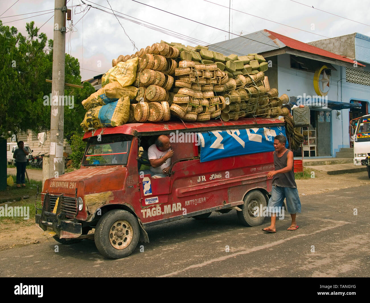 Overloaded traditional jeep (Jeepney), at Bohol island, Central Visayas, Philippines Stock Photo
