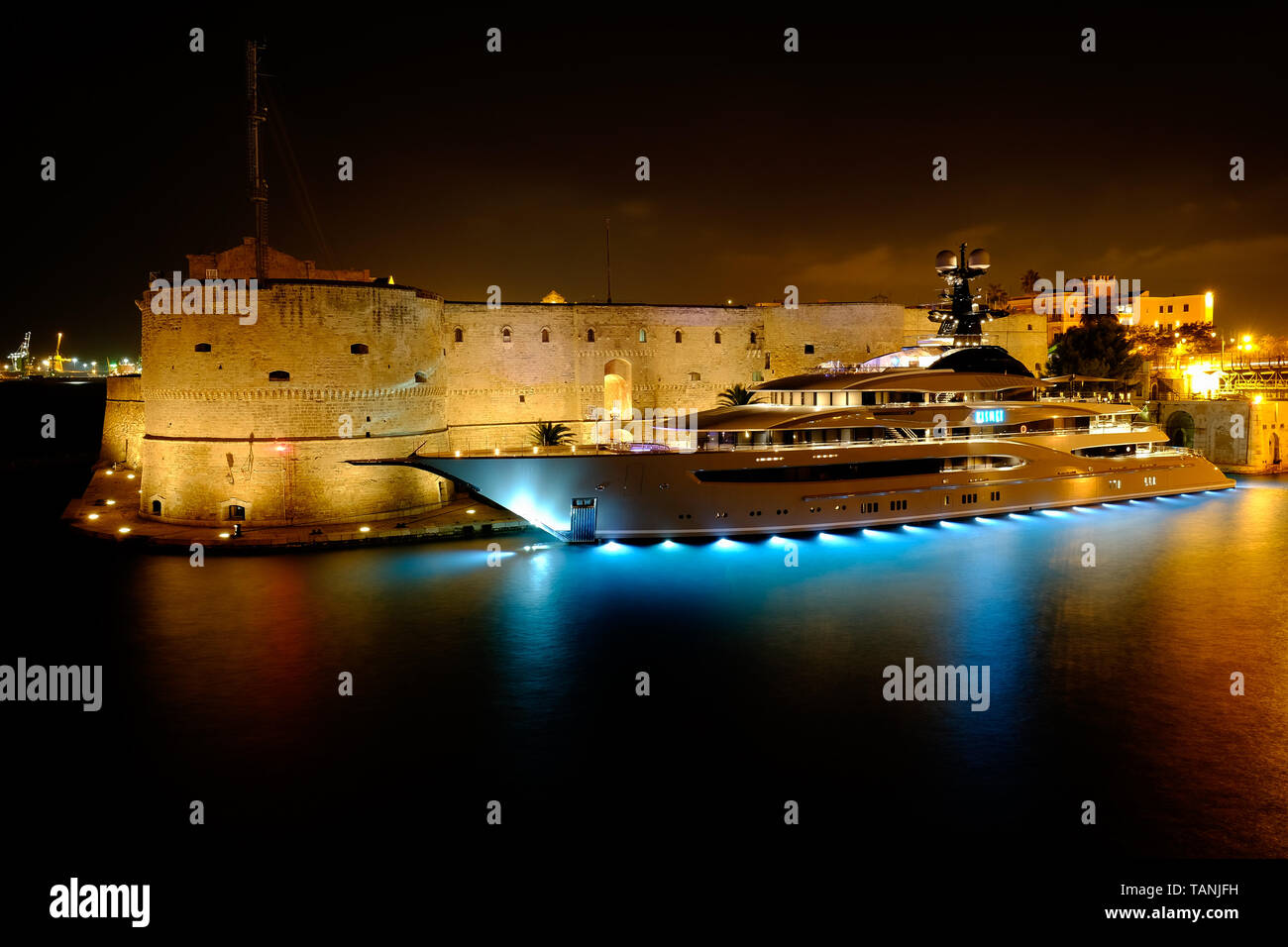 One of the largest and most luxurious yachts in the world called Kismet moated in front of the quay of the Aragonese Castle of Taranto-Italy. Stock Photo