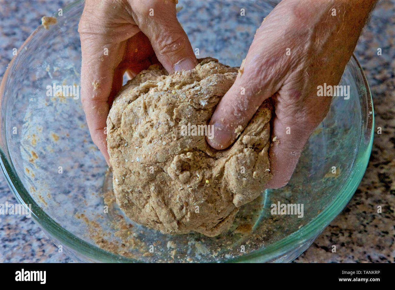 Making brown bread by hand at home, England Stock Photo Alamy