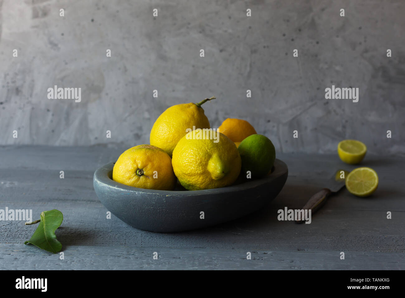 Still life with fresh yellow lemons in a bowl Stock Photo Alamy