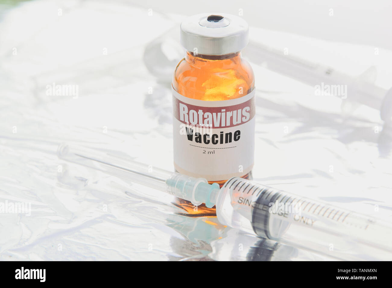 Open vial rotavirus vaccine vial on white background Stock Photo