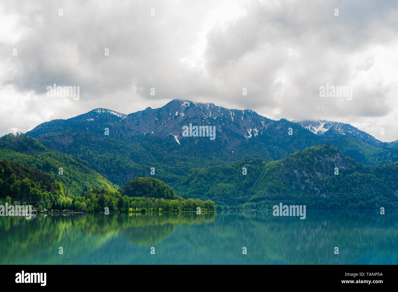 beautiful view on mountain and reflecting water in bavaria Stock Photo