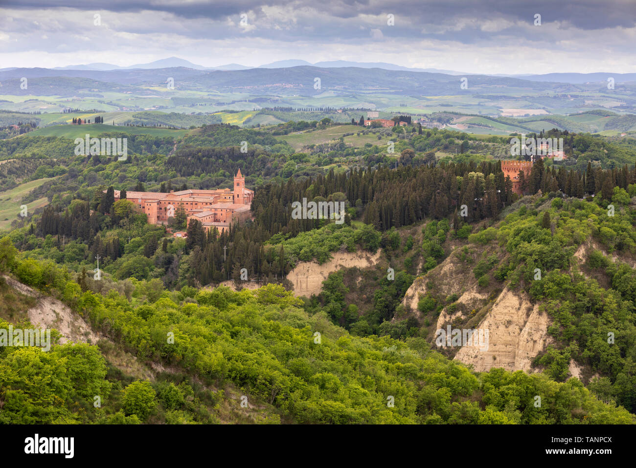 Abbazia di Monte Oliveto Maggiore monastery and Tuscan landscape, Chiusure, Siena Province, Tuscany, Italy, Europe Stock Photo