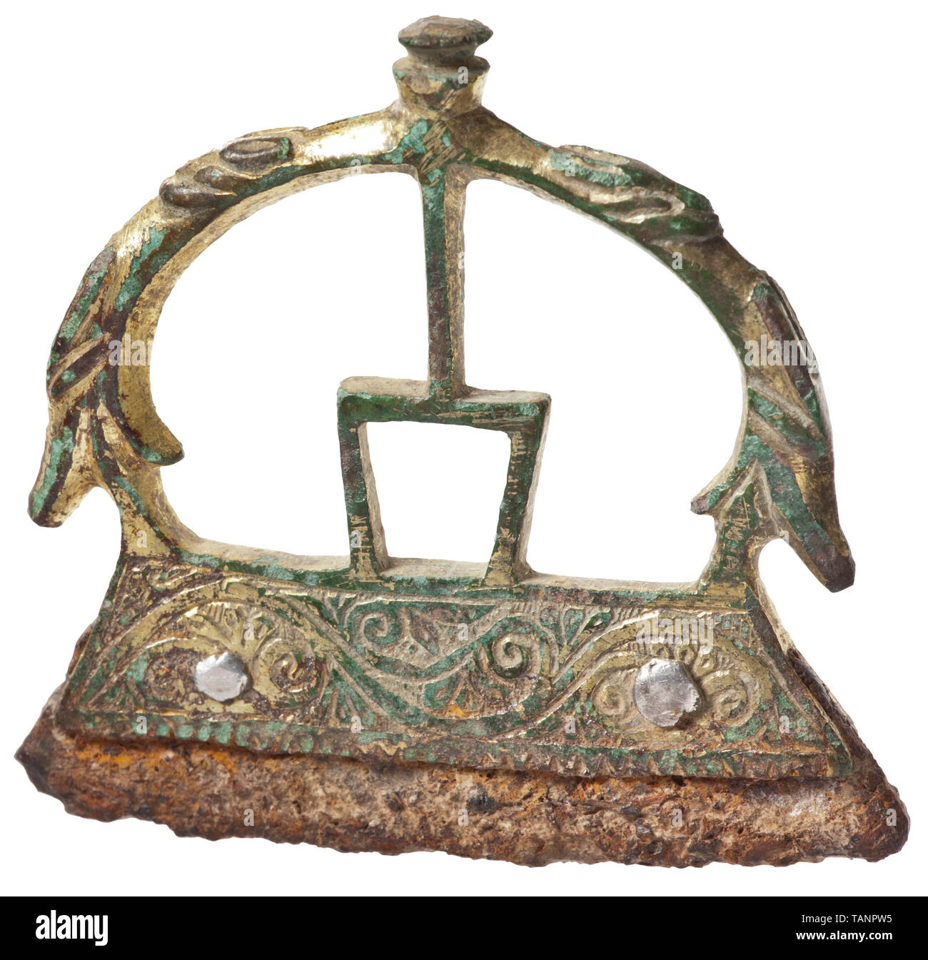 A richly decorated, Slavic-Byzantine fire striker, 9th - 10th century, Openwork bronze grip with gilt surface, stylised human figure at centre and two stylised animal heads at the sides. At bottom a trapezoid fire striker with bronze border and fine scrolling leaves in low relief. The fire striker fixed with two silver rivets located underneath the wave ornament. A work of extraordinary high quality from South Eastern Europe, made in the High Middle Ages. Apart from minimal chippings at the lower edge of the fire striker in excellent condition. T, Additional-Rights-Clearance-Info-Not-Available Stock Photo