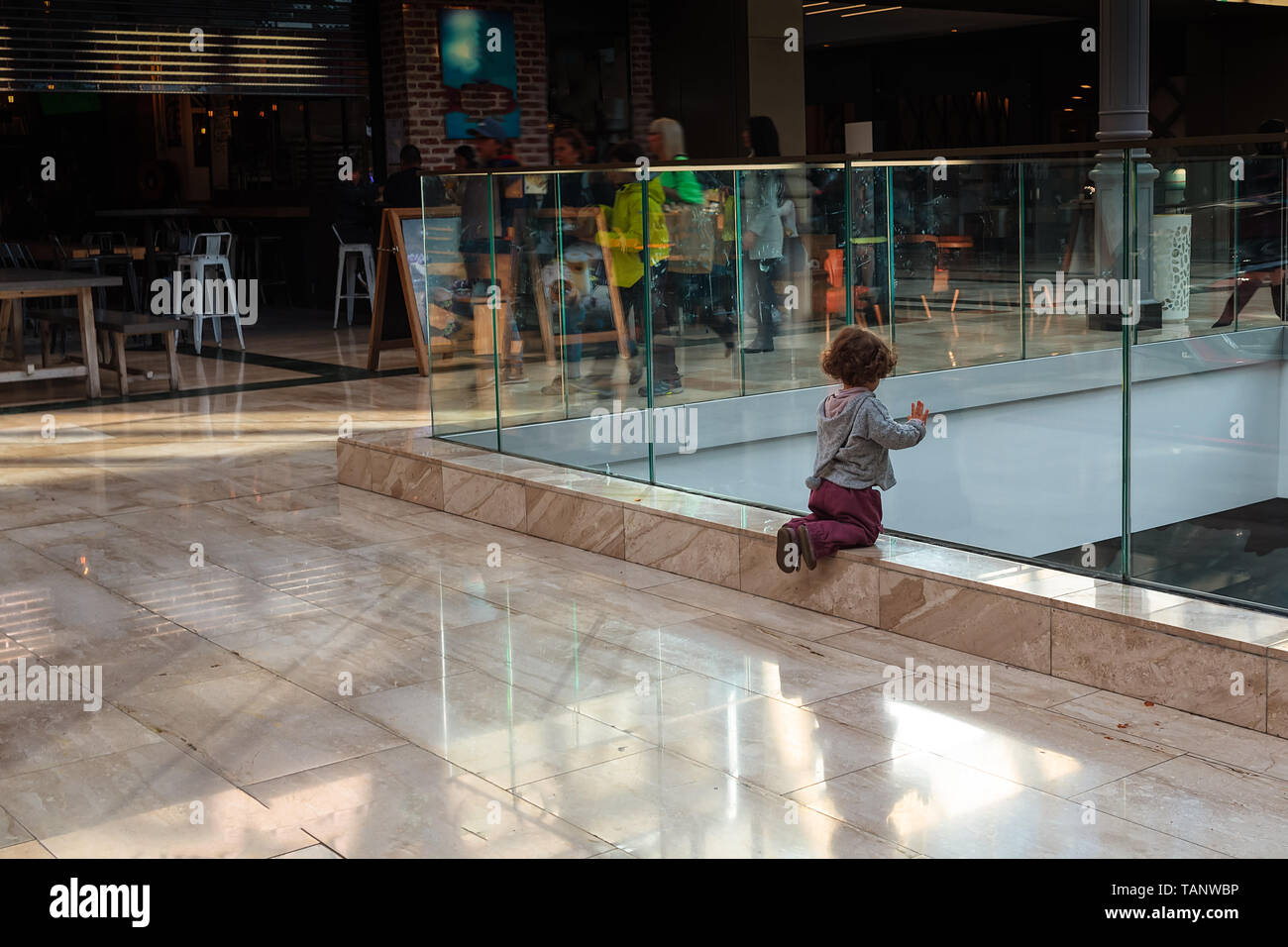 Child Rushing Child kneeling floor hi-res stock photography and images - Alamy
