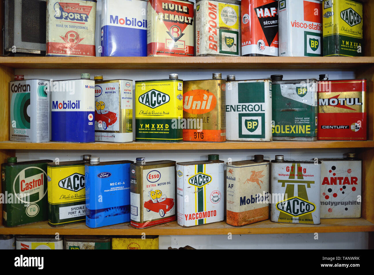 Display of Old Motor Oil or Engine Oil Cans of Different Brands incl Mobiloil, Yacco, Castrol, Esso, Renault, at Automobile Museum of Provence Orgon Stock Photo