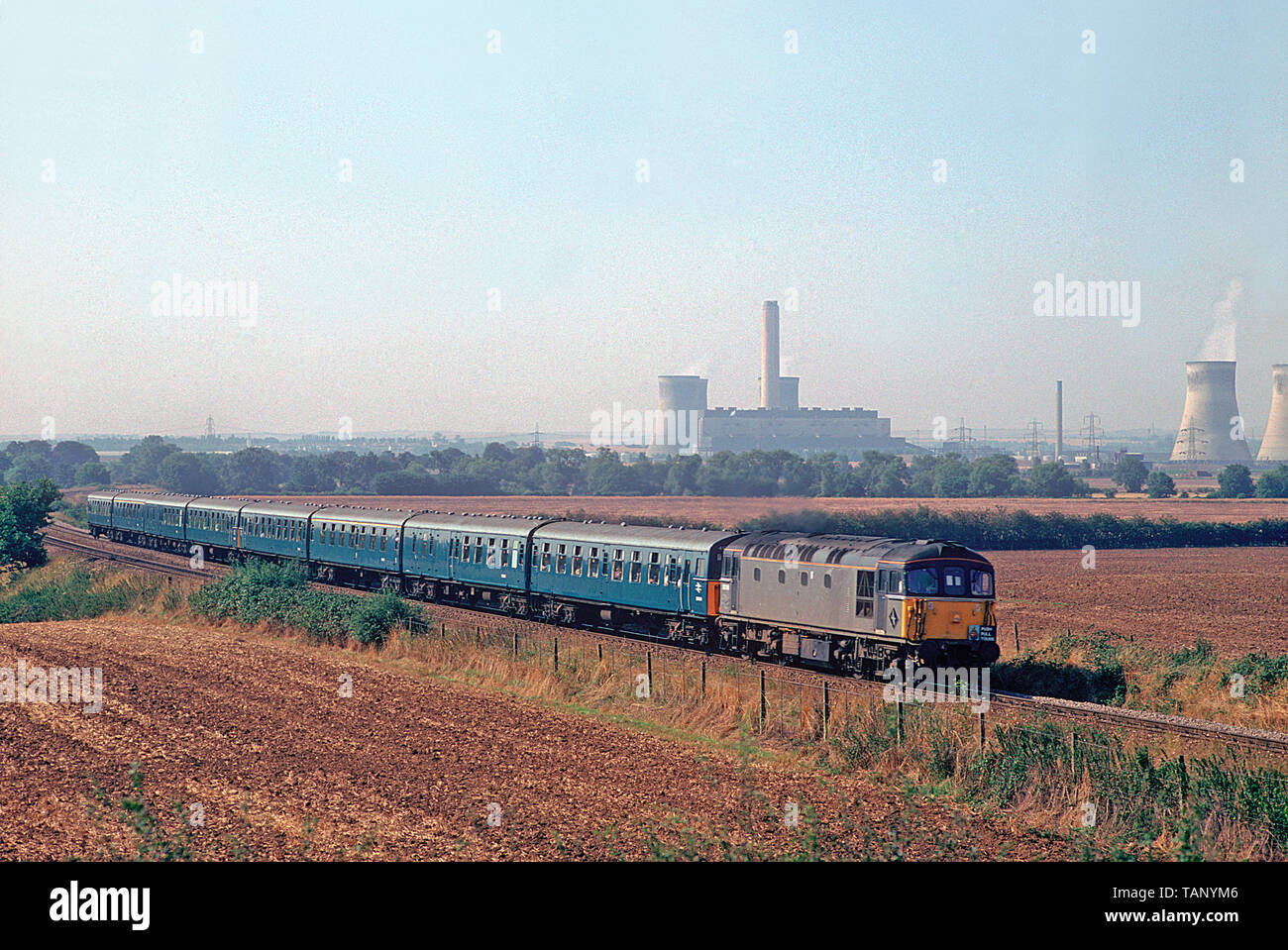 A class 33 Crompton locomotive number 33116 and the 8TC set are working ...