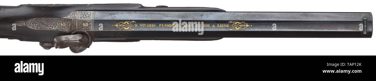 A percussion pistol, N. Vivario-Plomdeur, LiÃ¨ge, circa 1860 Octagonal, rifled barrel with deep black finish, in 12 mm calibre. On top of the barrel signed in gold 'N. Vivario Plomdeur Arqber. du Roi a Liege'. Engraved patent breechblock, inscribed '2'. Percussion lock with tendril engraving. Finely carved ebony stock with silver wire inlays and engraved, iron furniture. The stock with small shrinkage cracks near the bedding and the fastening of the barrel. Length 39.5 cm. Beautiful weapon, improvable by careful cleaning. historic, historical, ci, Additional-Rights-Clearance-Info-Not-Available Stock Photo