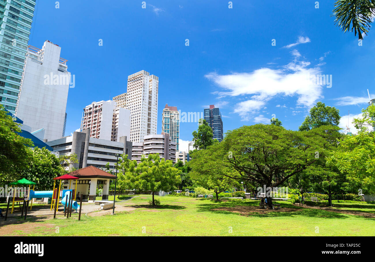 Green park in the center of Makati, Philippines Stock Photo
