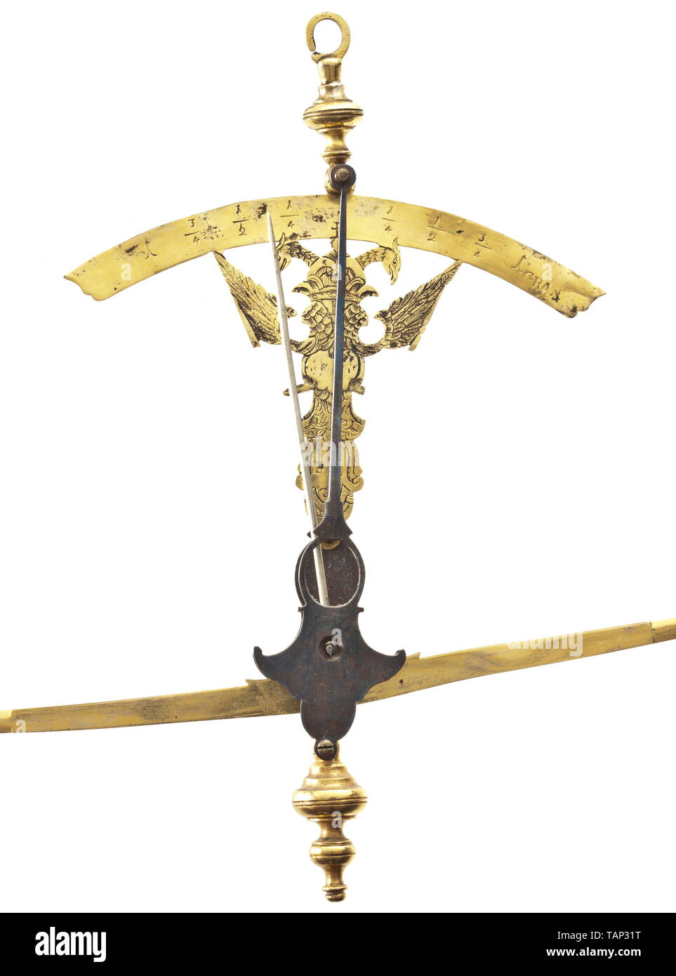 A pair of German jeweller's or coin scales, circa 1700 Openworked and engraved double-headed eagle with a semicircular, fire-gilt brass scale, the lower section stamped 'F M'. The screw-mounted, blued iron bracket with attached, gilded balance beam, the two balancing pans each bearing a stamped lion's mark. The strings are a later replacement. Width 16.7 cm. historic, historical, handicrafts, handcraft, craft, object, objects, stills, clipping, clippings, cut out, cut-out, cut-outs, Additional-Rights-Clearance-Info-Not-Available Stock Photo