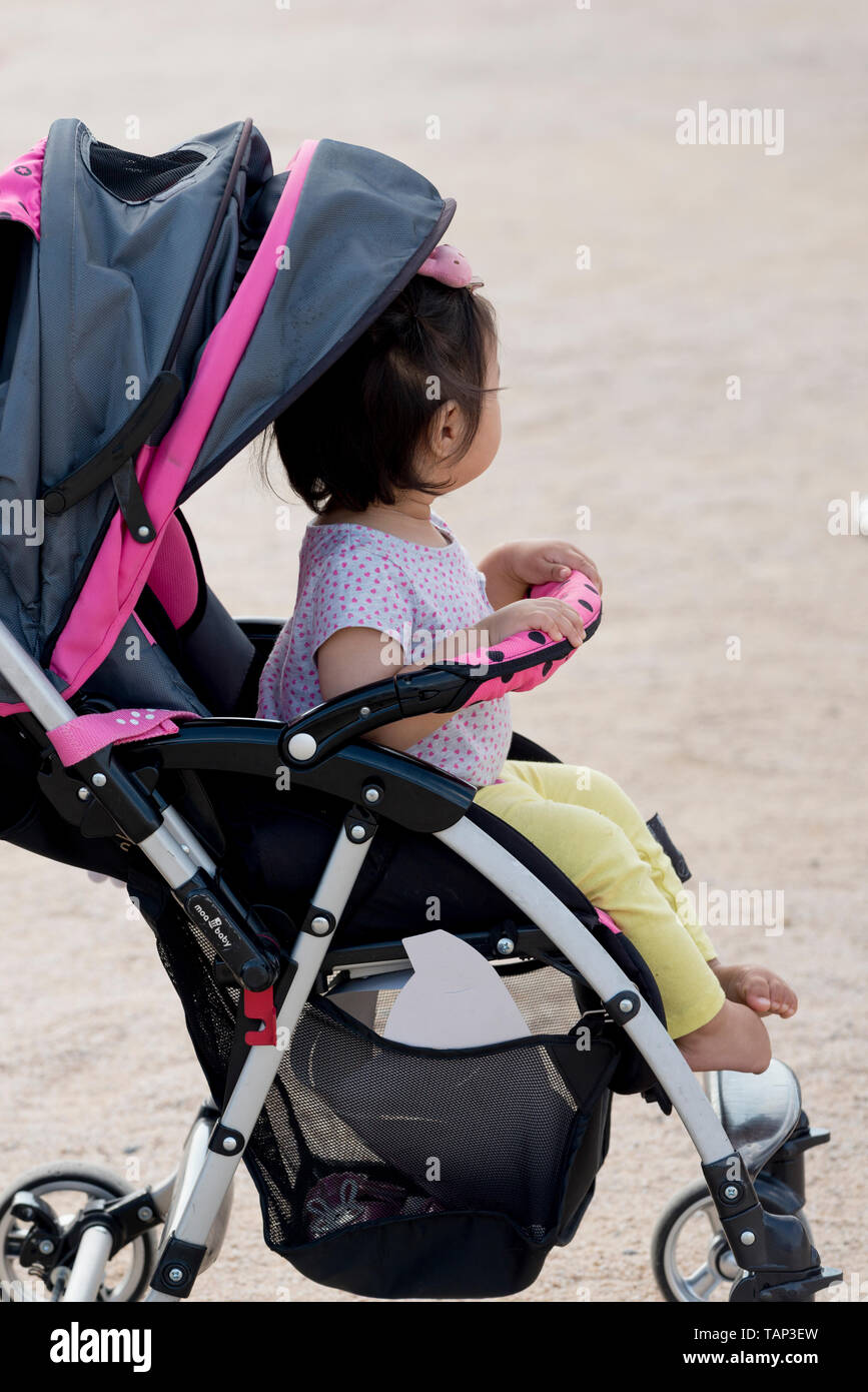 Girl stroller sitting hi-res stock photography and images - Alamy