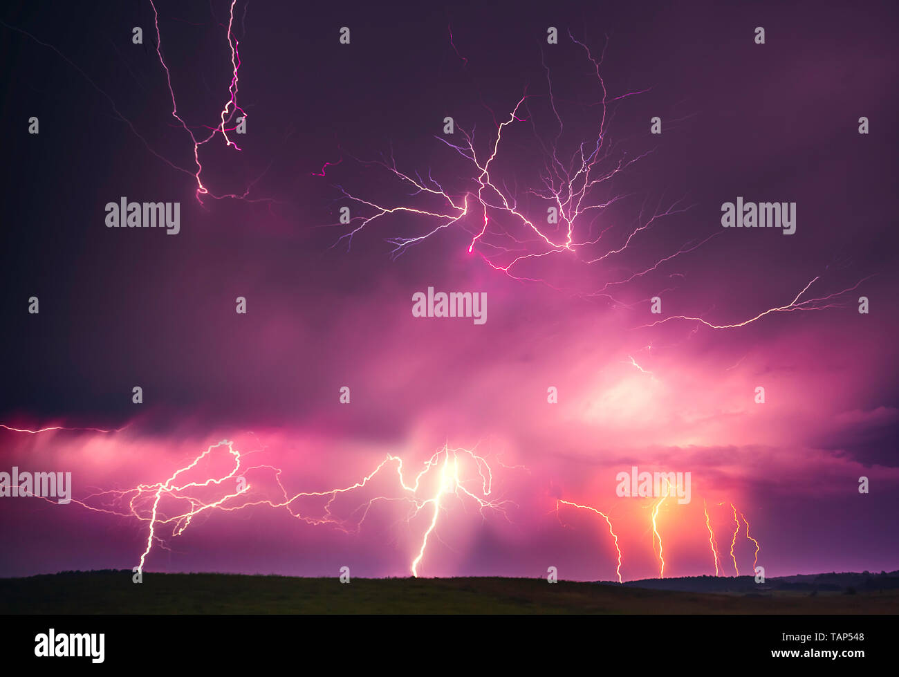 Lightning with dramatic clouds composite image . Night thunder-storm in Lithuania Stock Photo