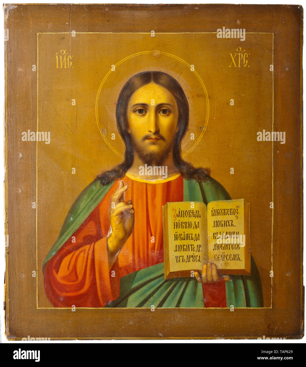 A Russian icon 'Christus Pantokrator' with silver and partly enamelled oklad, dated 1880 Tempera on wood, beautiful silver and gilt oklad (finely wrought, chased and engraved), at the top edge a hard to read master's mark 'VK', a Moscow fineness punch for 84 zolotniki and master's inspection punch 'IK' with struck year cypher '1880'. In good condition and of outstanding quality. Dimensions 33.5 x 30.3 cm. Included is an accompanying expertise in German. historic, historical, 19th century, Additional-Rights-Clearance-Info-Not-Available Stock Photo