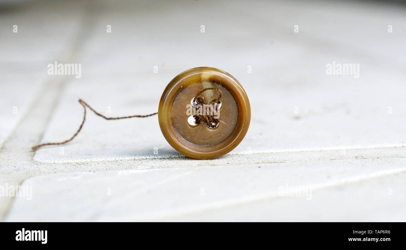 old brown sewing button image of a Stock Photo - Alamy