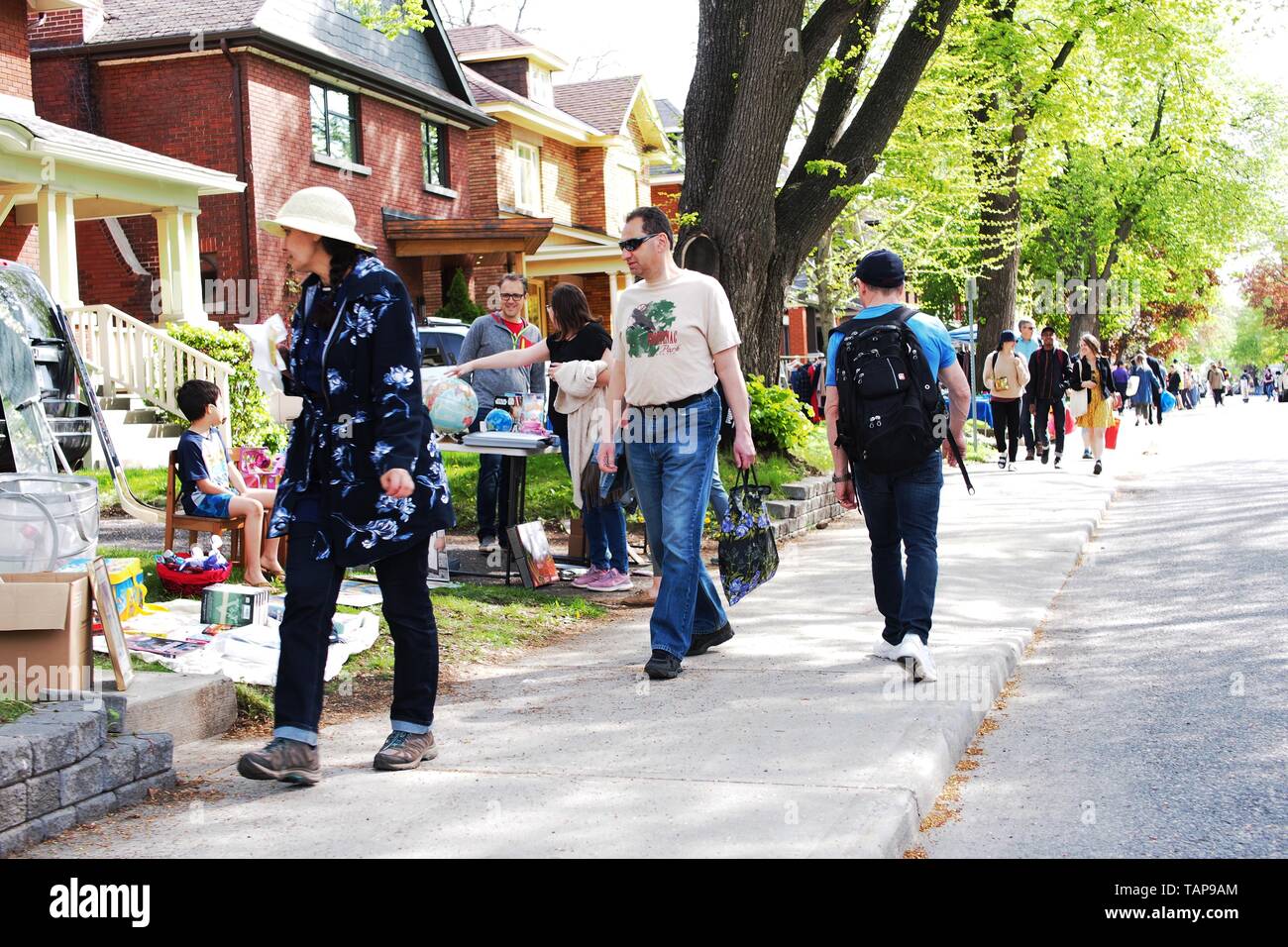 People browsing stalls at the Great Glebe Garage Sale, Ottawa, Ontario, Canada, 2019 Stock Photo