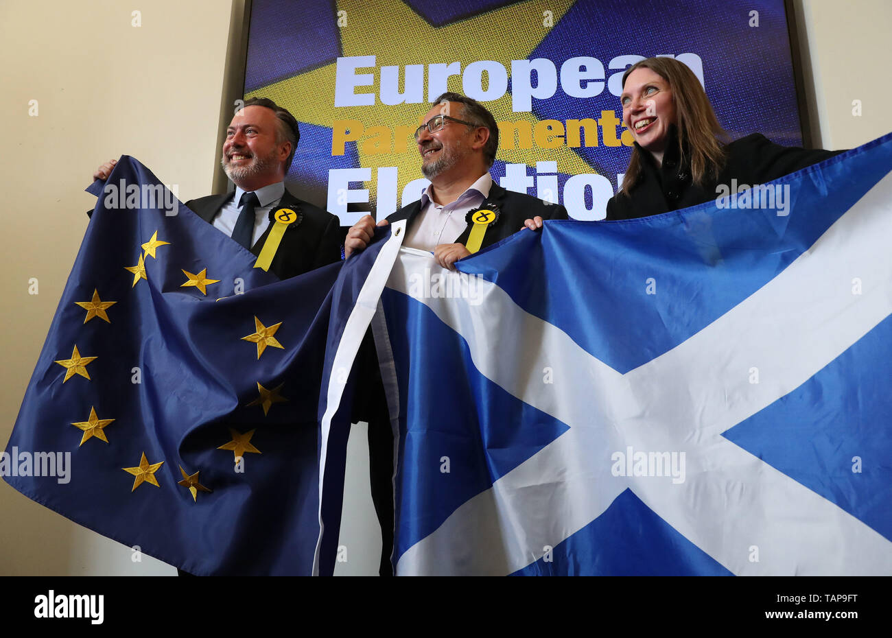 Newly elected SNP MEPs L-r Alyn Smith, Christian Allard and Aileen McLeod at the European Parliamentary elections count at the City Chambers in Edinburgh. Stock Photo