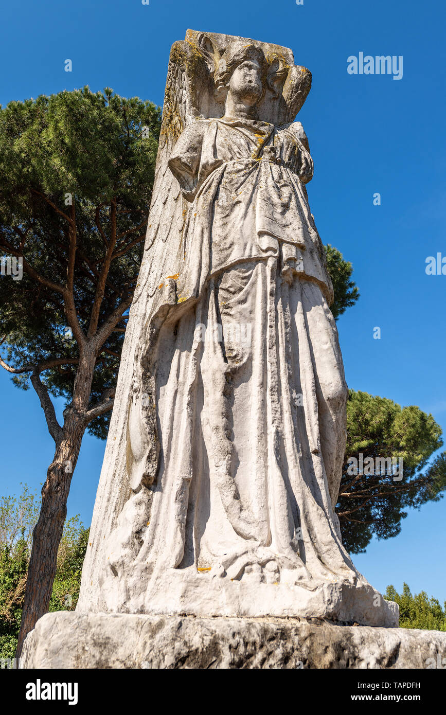 Ancient roman statue of winged Minerva Victory in Ostia Antica, Roman