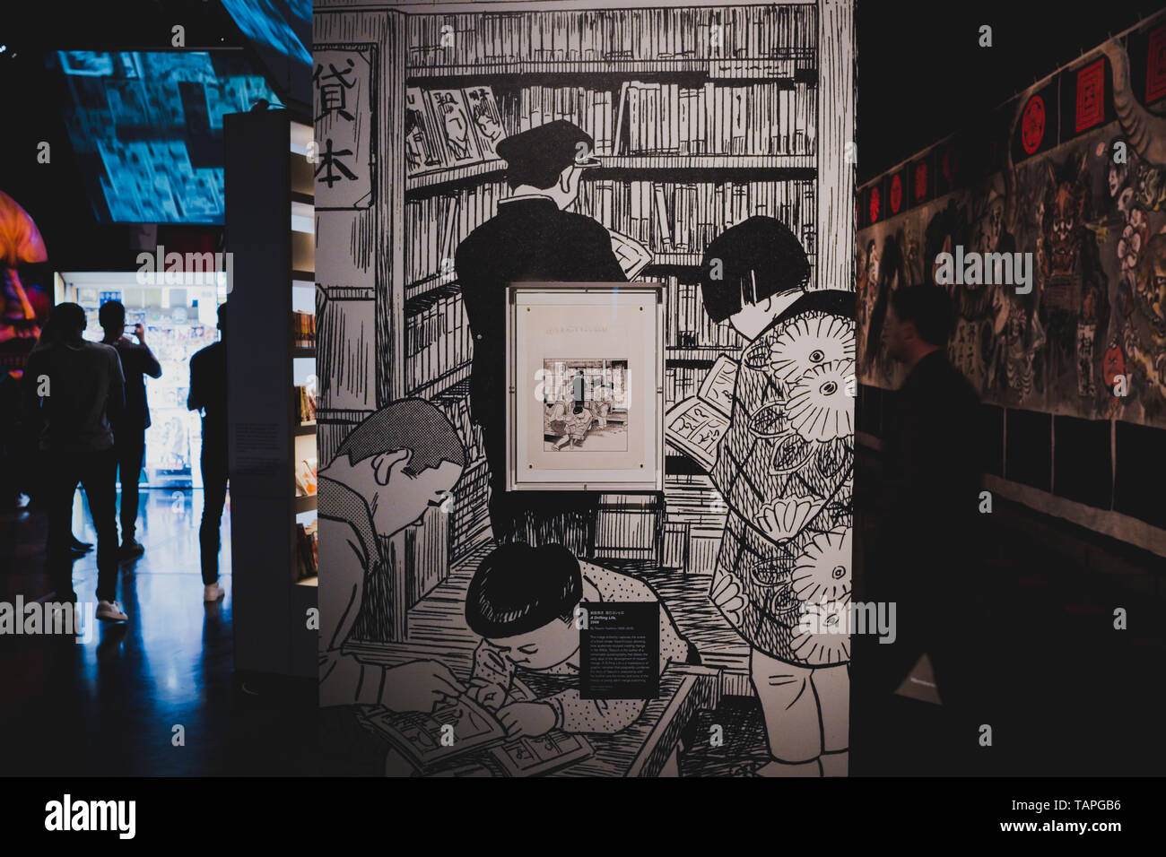 Framed manga page on display 'Manga' exhibition at the British Museum