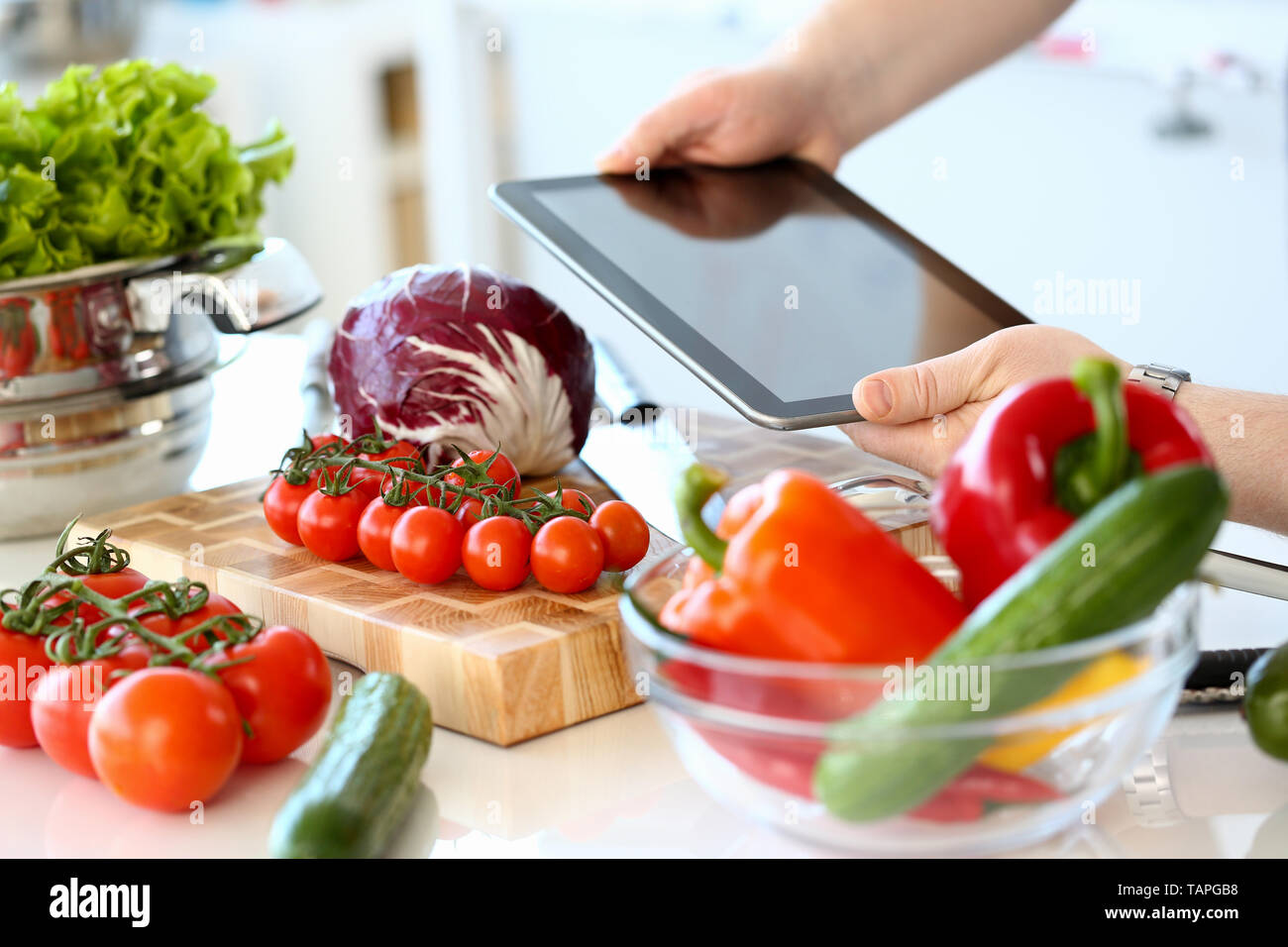 Chef Hands Recording Organic Salad Vegetables Stock Photo
