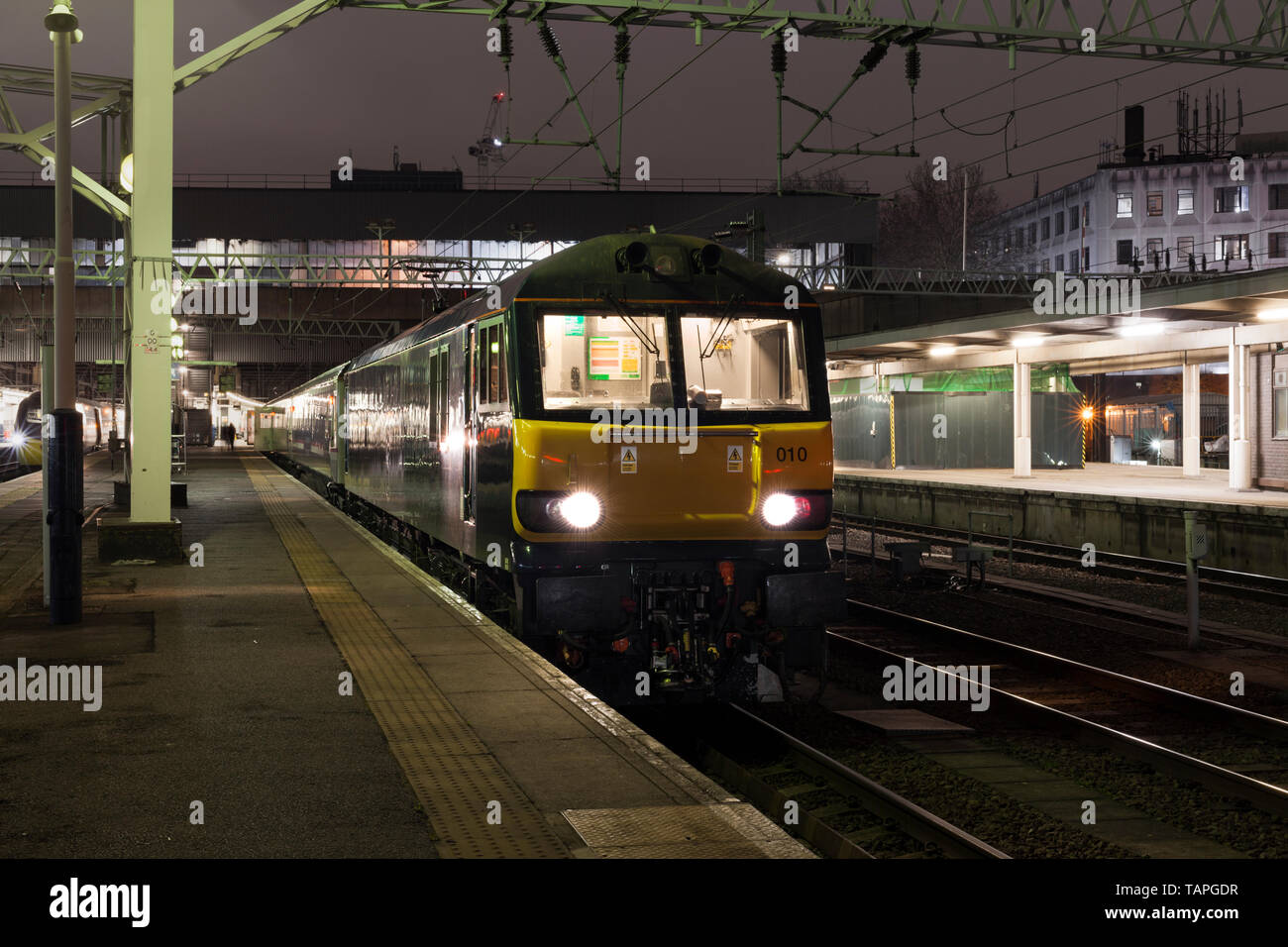 The 2116 London Euston - Inverness, Aberdeen & Fort William highland Caledonian sleeper train waiting to depart from London Euston station at night Stock Photo