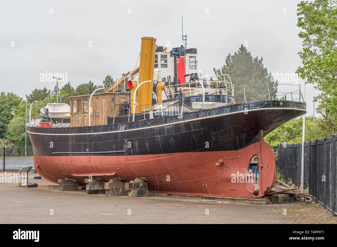 Irvine, Scotland, UK - May 25, 2019: Irvine Harbour Maritime Museum North Ayrshire Scotland Looking Over some ancient maritime puffers that are berthe Stock Photo