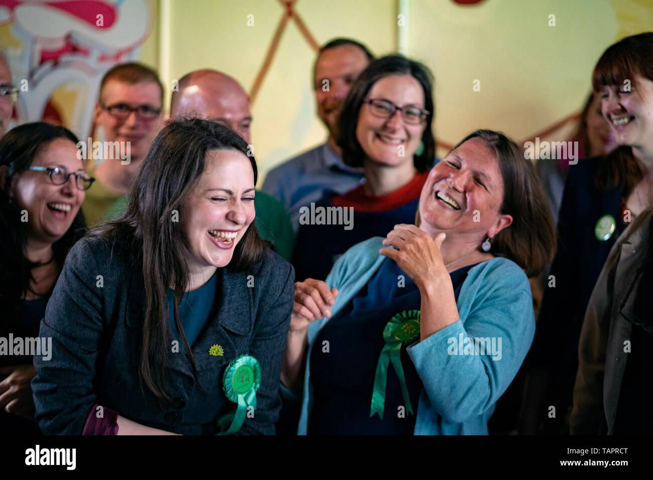 Birmingham, UK. 27th May, 2019. Green Party deputy leader Amelia Womack (center left) joins new West Midlands MEP Ellie Chowns (center right) and members from across the West Midlands in Birmingham celebrate the results of the EU election that saw Greens rise from three to seven seats in England. Credit: Vladimir Morozov/Alamy Live News Stock Photo